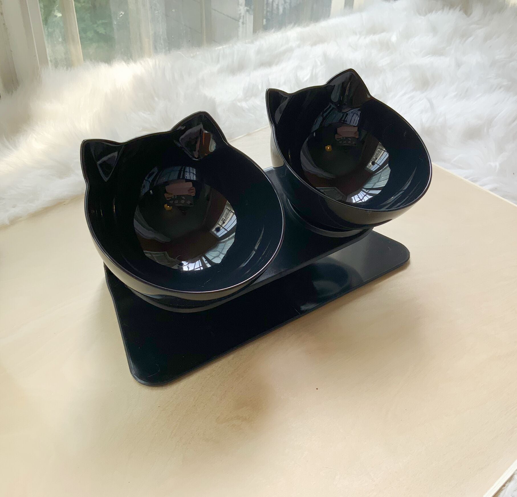 Black elevated feeding bowl for cats