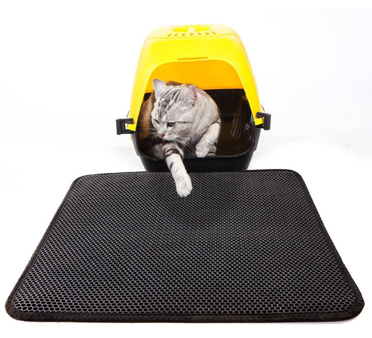 Waterproof cat litter mat helping keep floors clean around the litter box
