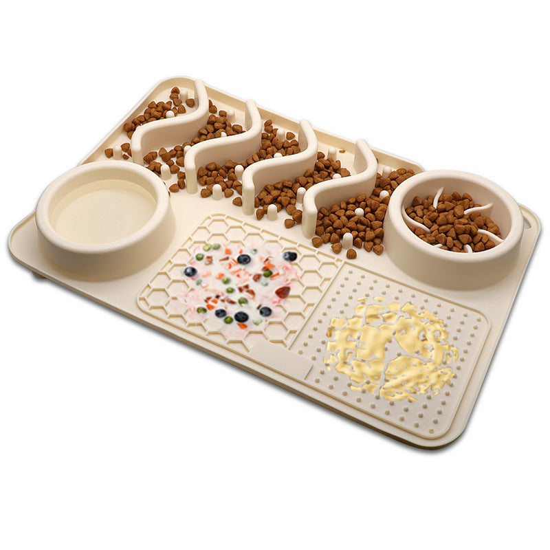 Cream silicone dog slow feeder mat with raised ridges, water bowl, and licking pad compartments