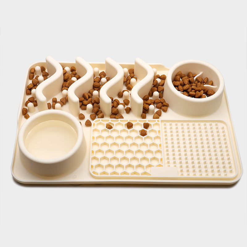 Cream small silicone dog slow feeder mat with raised ridges, water bowl, and licking pad compartments
