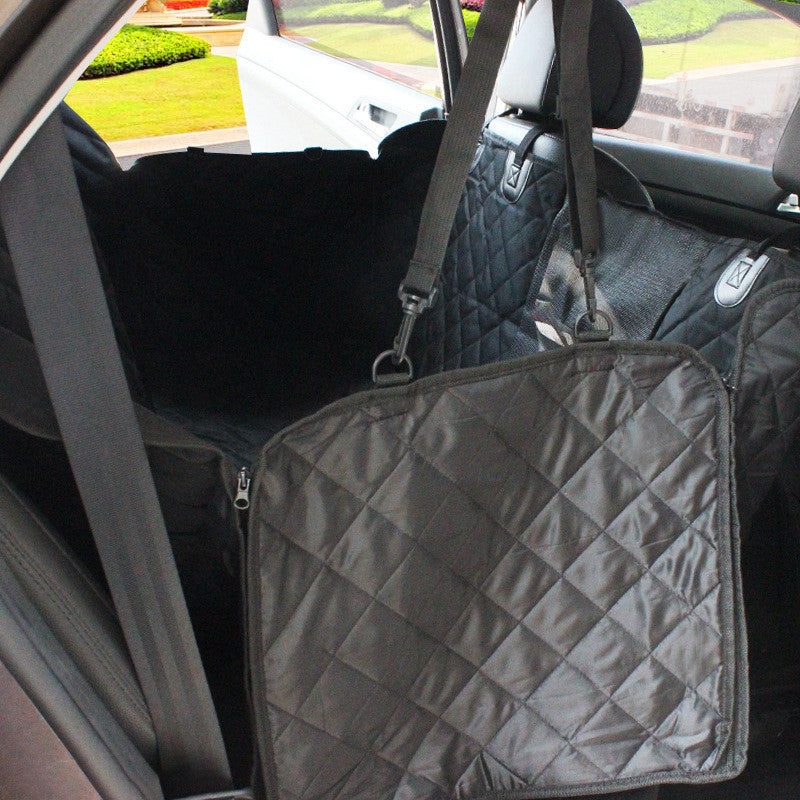 Waterproof dog seat cover installed on a car's back seat