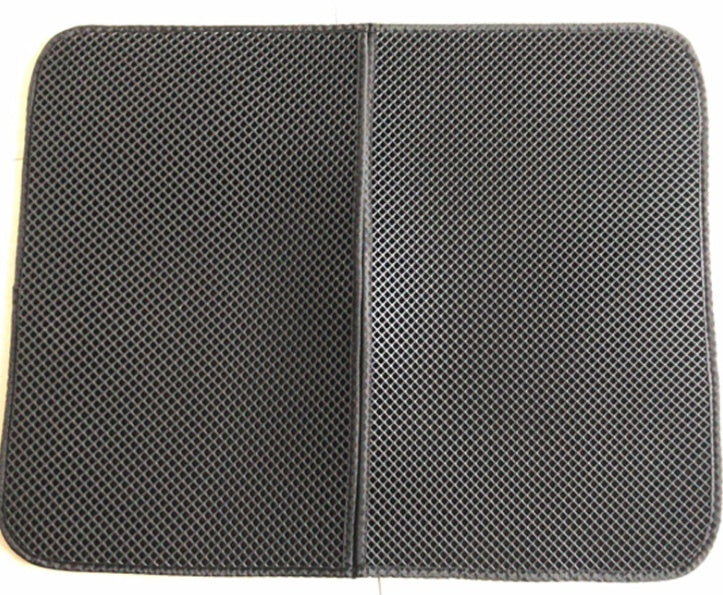 Close-up of the soft honeycomb texture on a cat litter trapping mat