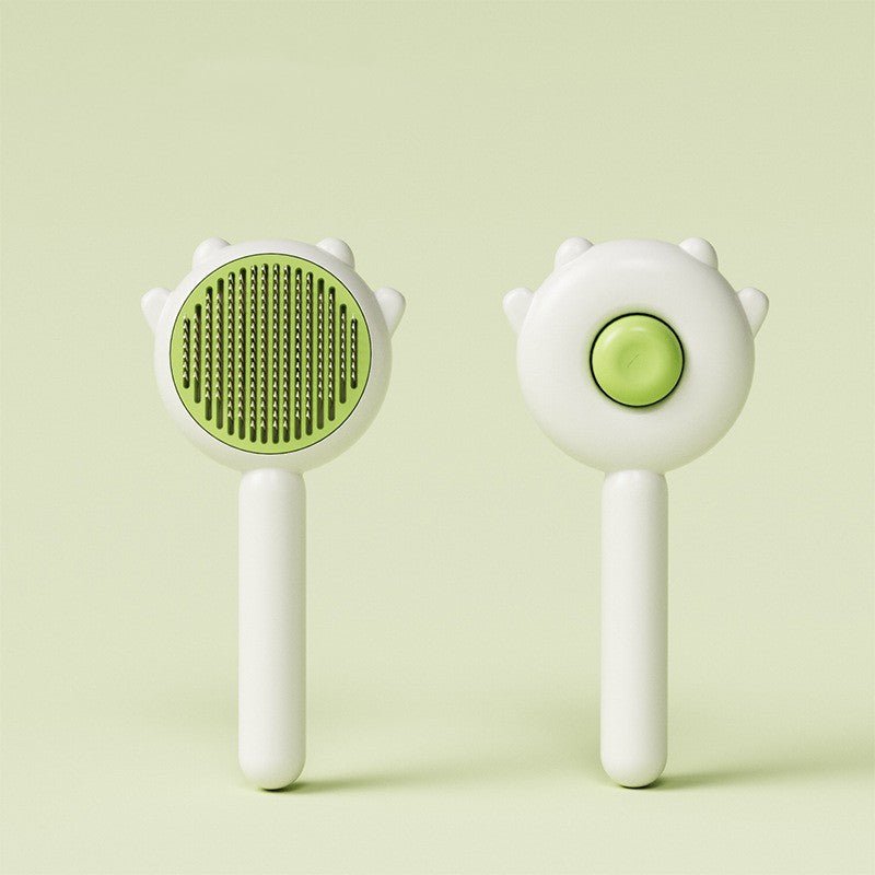 Pet grooming brush available in green colors