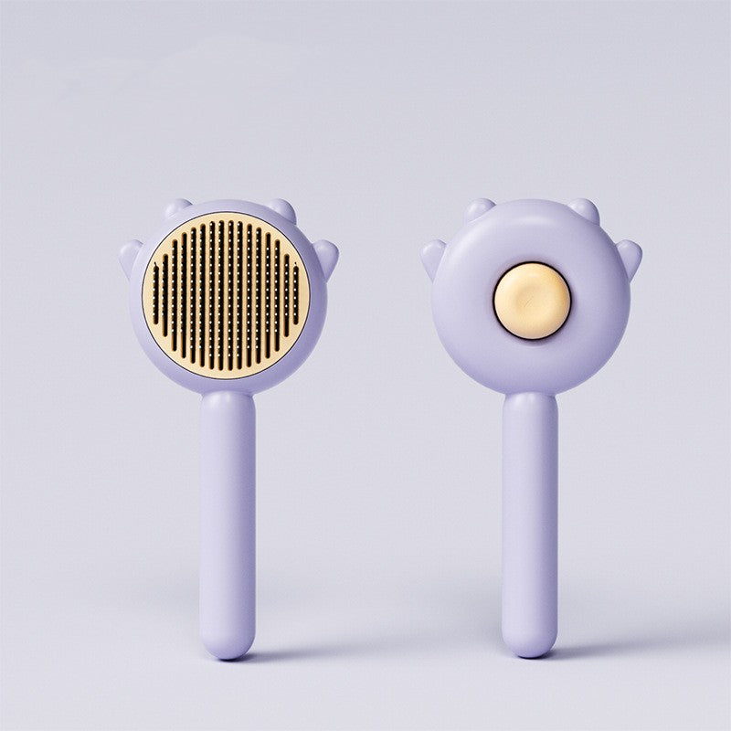 Pet grooming brush available in purple colors
