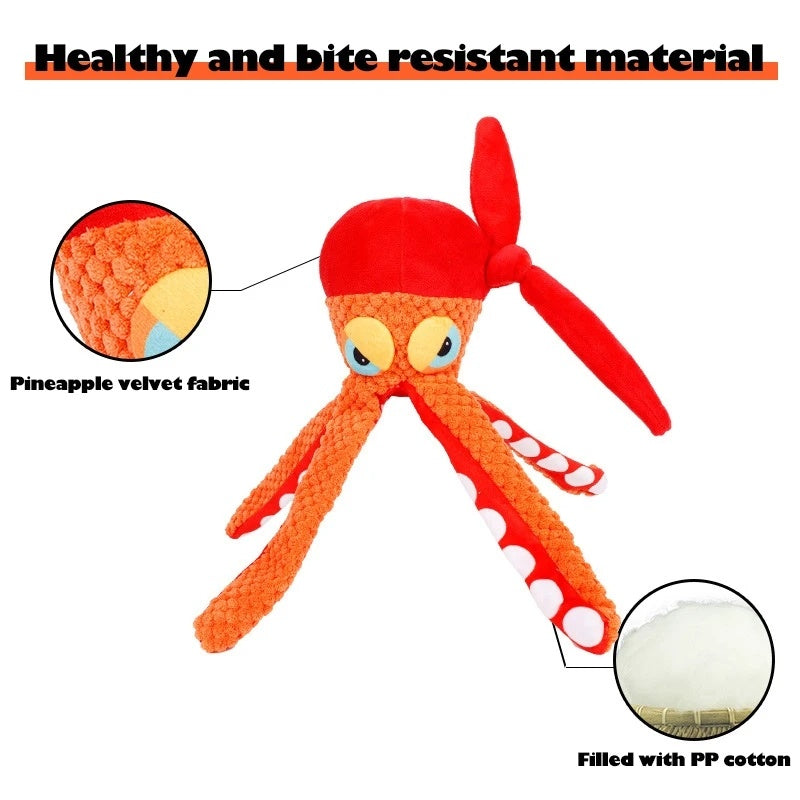 Plush octopus toy with red head and orange body, labeled 'Healthy and bite resistant material' with fabric and filling details.