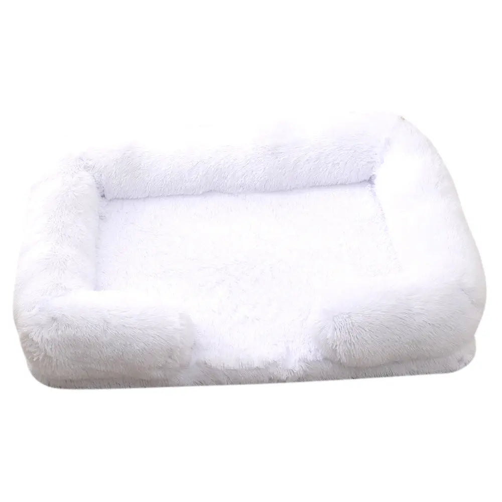 White plush calming bed for dogs and cats